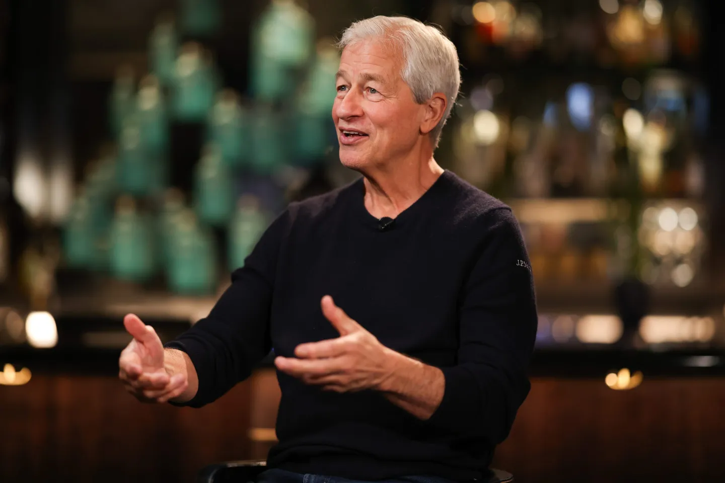 JPMorgan Chase CEO talks and gestures with his hands